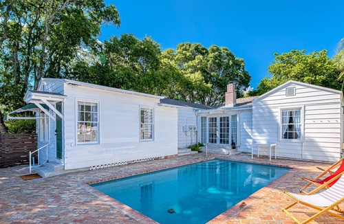 Poiciana Park II Apartment | Stylish, dog-friendly home with a pool, enclosed yard, patio, & central AC