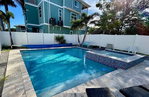 Fort Myers Beach House | Stylish Home with New Luxury Pool! Steps to Beach, Restaurants, Nightlife, Entertainment, and more!