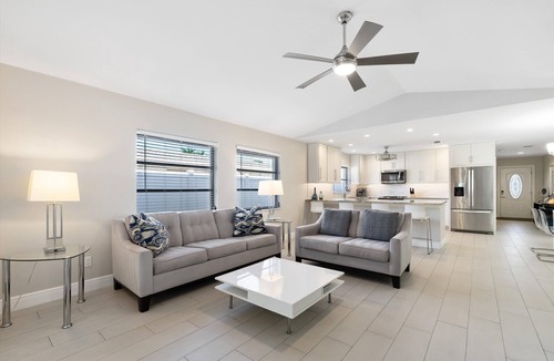 Naples Park House | SUMMER SPECIALS! Designer House, Heated Pool & Spa, close to beaches, FREE Bikes