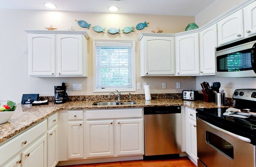 Holmes Beach House | Sunbreeze – Tropical Poolside Living Just Steps from the AMI Beaches