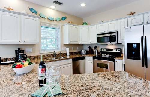 Holmes Beach House | Sunbreeze – Tropical Poolside Living Just Steps from the AMI Beaches