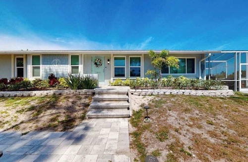 Cortez House | Sunny canal front home with a pool & dock - central location and dogs ok