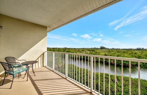 Ruskin House | Sunrise Waterfront 2BR Townhome - Pool & Private Terraces
