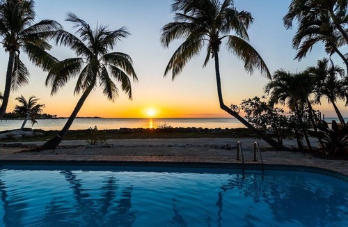 Marathon House | Sunsets in Paradise~ Gulf Front Pool Home, 22' Dock, Kayaks, Bikes & Paddleboards