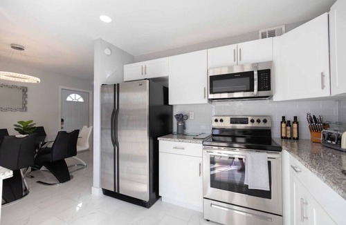 Greenacres Villa | Sunshine Retreat! New! Sparkling Blue Pool And Spa