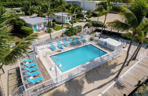 Islamorada Apartment | Swim with Dolphins in the Florida Keys! FREE Breakfast & Parking, Marina, Pool!