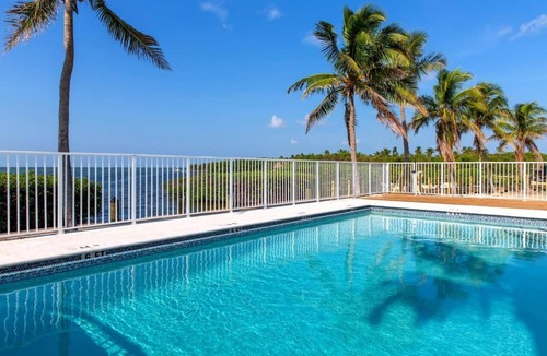 Islamorada Apartment | Swim with Dolphins in the Florida Keys! FREE Breakfast & Parking, Marina, Pool!