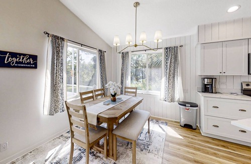 Indian Trails House | The Barefoot Bungalow House in Palm Coast With an Enclosed Pool & Grill