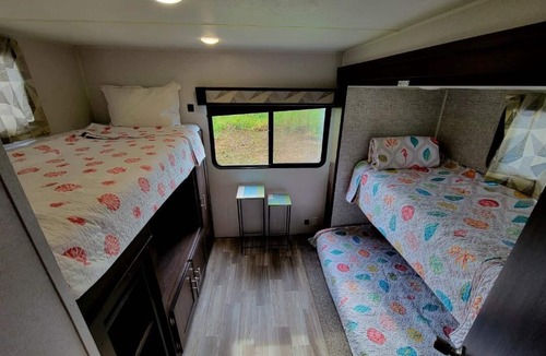 Greenacres House | The Driftwood Oasis Travel Trailer