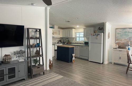 Flamingo Bay House | The Flamingo at Sandpiper 2 bed 2 bath waterfront location with dock and lift