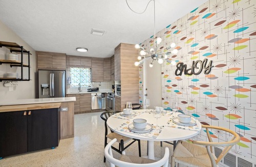 Ridge Wood Heights House | The Sarasota Starburst: Mid-Century Modern Home with Heated Pool, Dog Friendly, & Ideal Work Setup