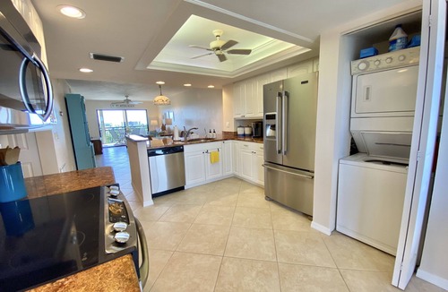 South Island Condo | Time to exhale. Sunrise from the balcony, and sunsets from the screened Lanai