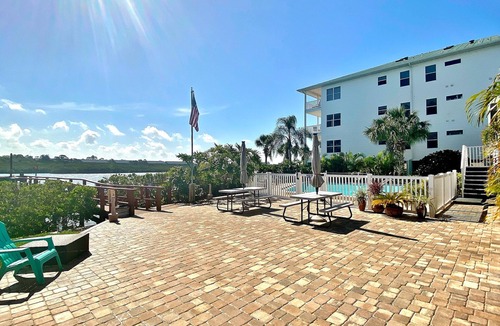 Indian Shores House | Townhouse Steps from the Beach with Screened Balcony, WiFi, AC & Shared Pools