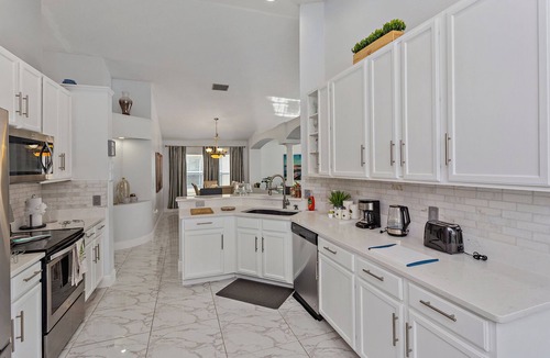 Eagle Pointe South House | Tranquil Times: Theater, Heated pool, Outdoor BBQ 6 miles from Disney