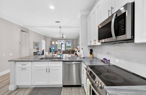 Tropical Cove Condo | Tranquil Waters at Lexington CC Lake Village