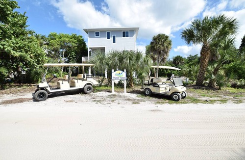 Captiva House | Triple Tales - Waterfront Property with Dock, Private pool & 2 minutes to beach!