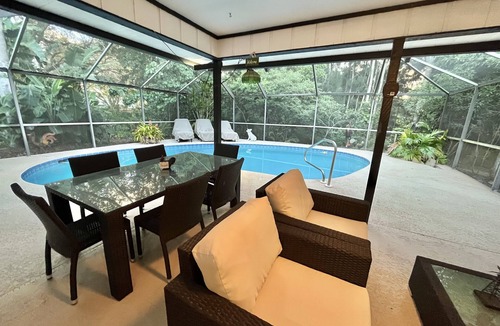 Indian River Estates House | Tropical Oasis With HEATED Pool, Just minutes from the Downtown and the Beaches.