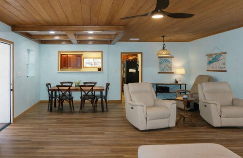 St. Lucie Village House | Tropical Pool Retreat + Walk to River + Pet Friendly
