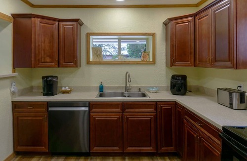 St. Lucie Village House | Tropical Pool Retreat + Walk to River + Pet Friendly