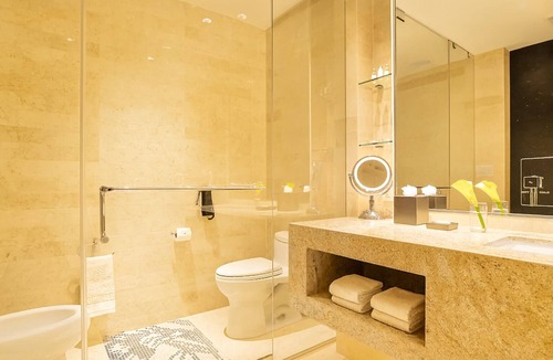 Seybold Hotel | Two Convenient Rooms with Large Glass Window and Outdoor Pool