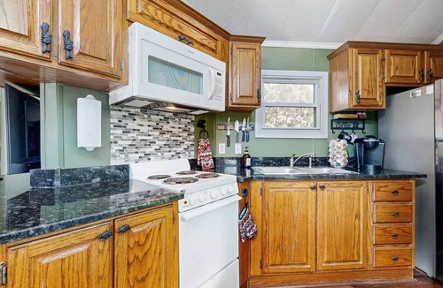 Gerton House | Updated Creekside Getaway with Private Waterfall | Near Asheville & Lake Lure