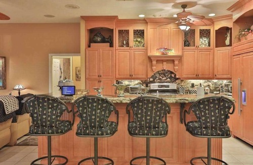 Naples House | Upscale waterfront home with private dock, saltwater pool, lanai, grill, & W/D