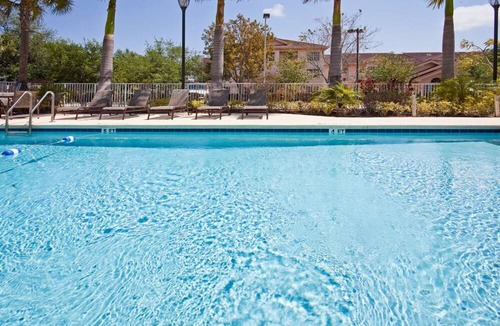 Villages of Palm Beach Lakes Hotel | Holiday Inn Express & Suites West Palm Beach Metrocentre, an IHG Hotel