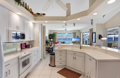 Yacht Club Villa | Villa Bel Air - right on the river - heated pool and spa - sun all day.