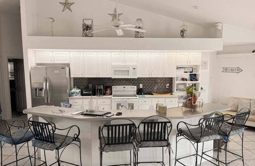 Yacht Club House | Villa Euphoria: Chic 2-unit, canal-front retreat with 2 pools & private dock