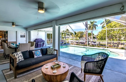 Caloosahatchee Villa | Villa Sunset Hideaway - Stylish 4 BR/2 bath waterfront Villa with heated pool/bicycles