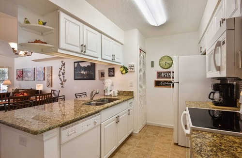Kissimmee Condo | Villas at Somerset, 2nd (top) floor condo, community pool, clubhouse, Wi-Fi