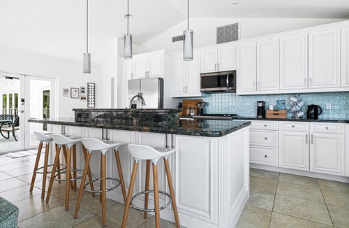 West Palm Beach House | Vista Bonita - Private Pool, Fire Pit, Mins to DT (fee applies if you would like the pool heater turned on)