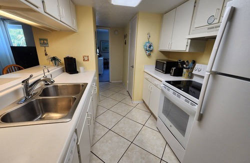 Bayview Condo | Watch the sunset over Boca Ciega Bay!