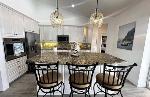 Marco Island House | Waterfront 3BR, heated pool, WiFi, and serene Mid-Island views.