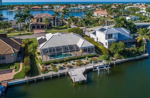 Marco Island House | Waterfront 3BR, heated pool, WiFi, and serene Mid-Island views.