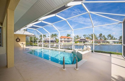 Marco Island House | Waterfront 3BR, heated pool, WiFi, and serene Mid-Island views.