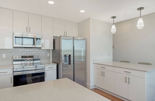 Central Sarasota Condo | Waterfront Coastal Elegance Top Floor at The Strand