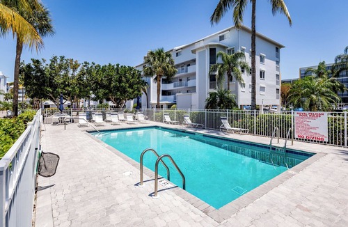 South Island Condo | Waterfront Condo with Private Balcony, Pool, Dock Access.
