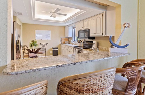 Clearwater Beach Condo | Waterfront End Unit ~ Pool/Hot Tub ~ Short Walk to Beach ~ Free Wi-Fi & Cable ~ 301 Bayway Shores