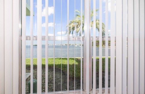 Dunedin Condo | Waterfront Escape! Heated Pool, BBQ, Clubhouse & Pier – Dolphins & Sunsets from Your Private Porch!