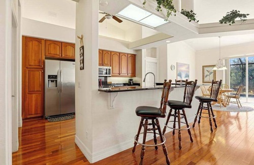 Bell Villa House | Waterfront home with private heated pool, dock, firepit, grill, bikes, fireplace
