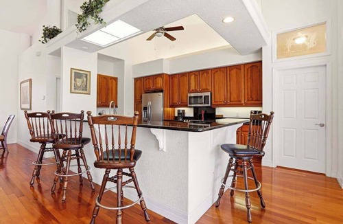 Bell Villa House | Waterfront home with private heated pool, dock, firepit, grill, bikes, fireplace