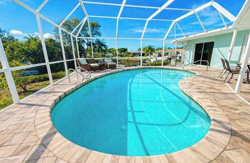 Sorrento Shores House | Waterfront home with pool, dock accessible to Gulf, dog friendly with AC & WD