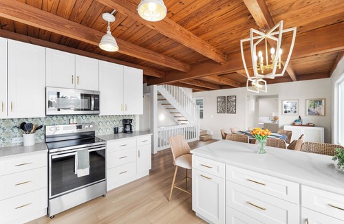 Butler Beach House | Waterfront | Pool | Canal | Game Room | Kayaks & Paddleboards