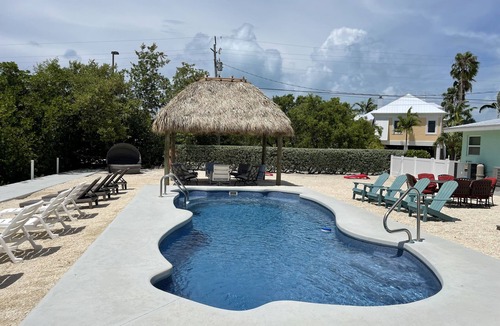 Marathon House | Waterfront Private Home-7 BR, 6 Full BA, Pool, 80' Dock, Parking, Screened Porch