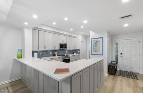 Isles of Capri Condo | Waterfront relaxation in a beautifully updated large condo!