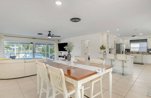 Waterway Estates House | Waterfront villa with pool- sleeps 8