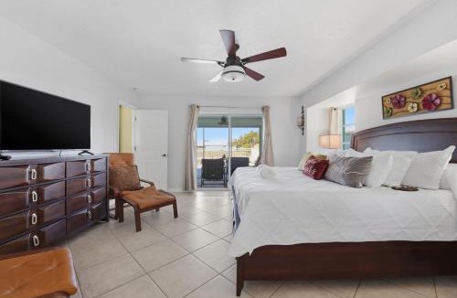 Gulf Cove House | Waterfront Villa w Pool, Dock and Gulf Access