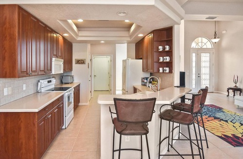 Long Meadow House | Welcoming 3-bedroom water front house with heated pool Rotonda West