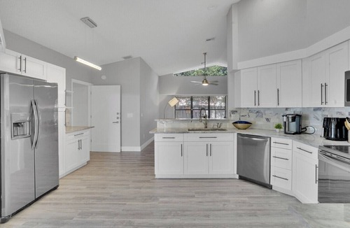 Wellington House | Wellington Pool Home Near WEF 4BR Heated Pool Sleeps 8+